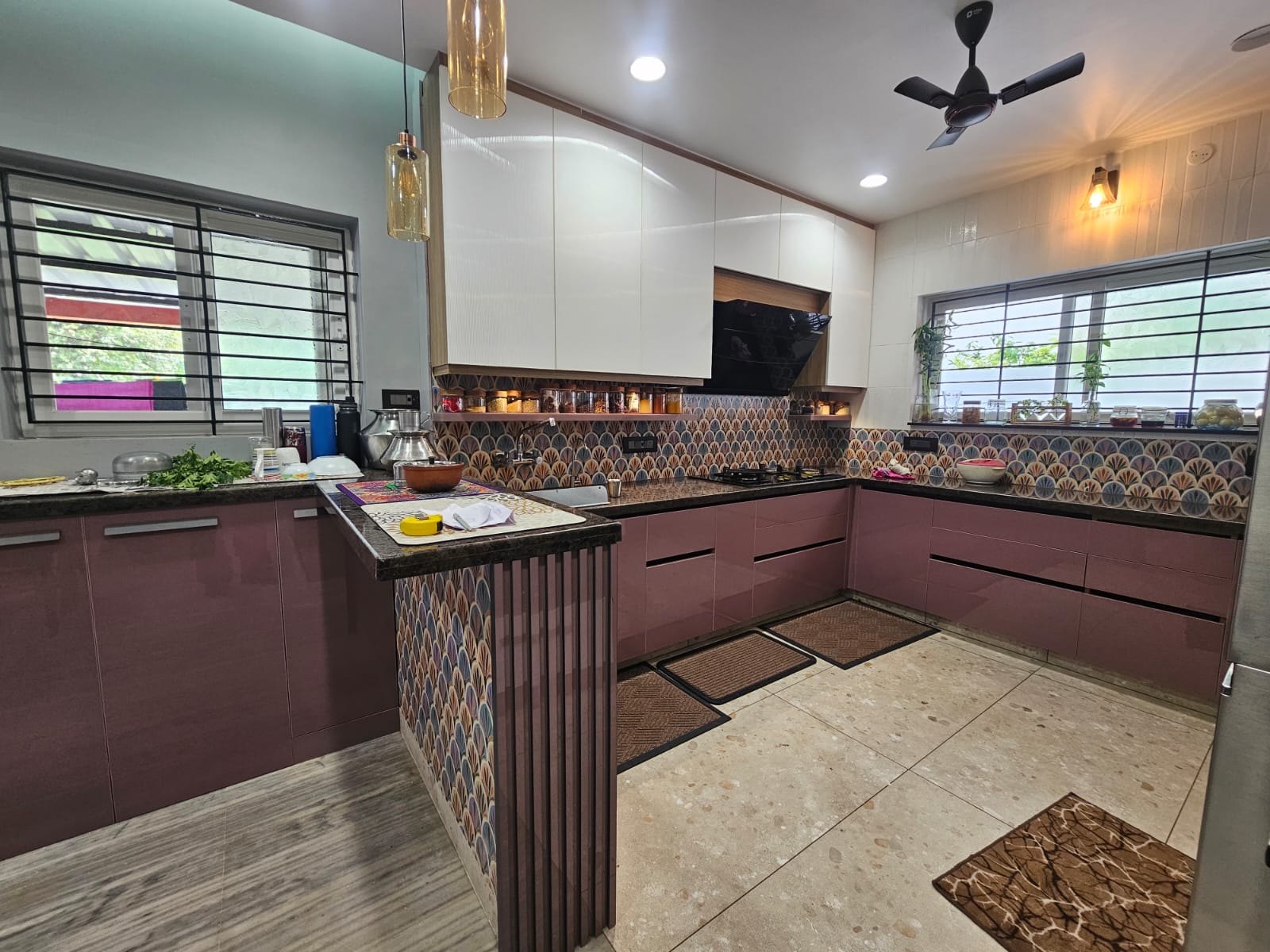 Completed U-shaped modular kitchen with breakfast counter